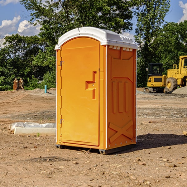 what is the cost difference between standard and deluxe portable toilet rentals in Ledyard